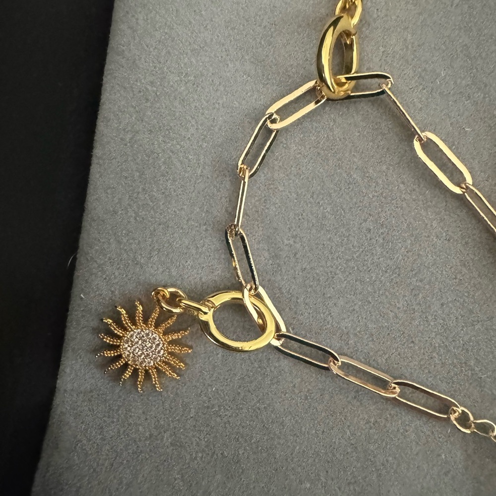 New Gold tone Charm bracelet